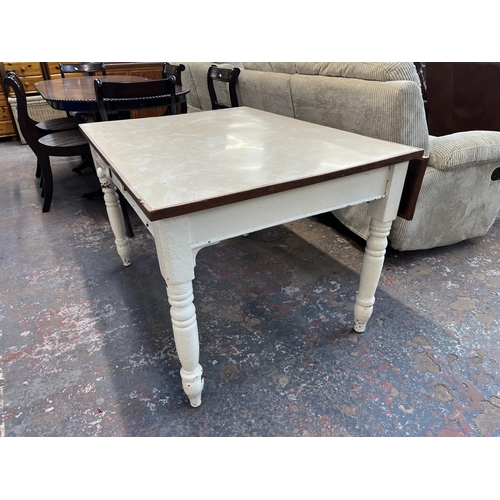 196 - A Victorian painted pine farmhouse dining table with later added top - approx. 73cm high x 86cm wide... 