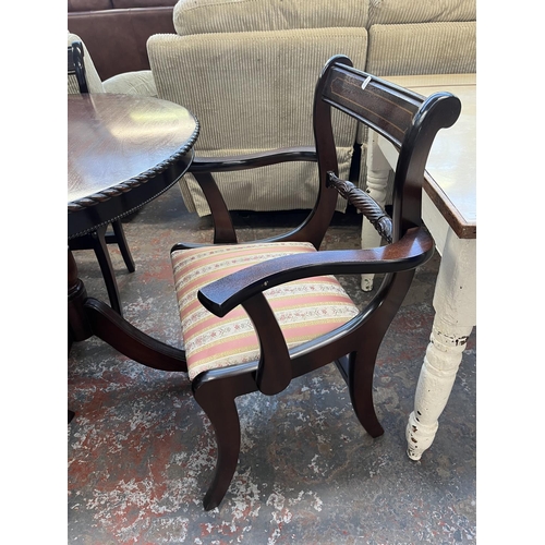 197 - A mahogany twin pedestal extending dining table and six chairs - approx. 77cm high x 93cm wide x 200... 