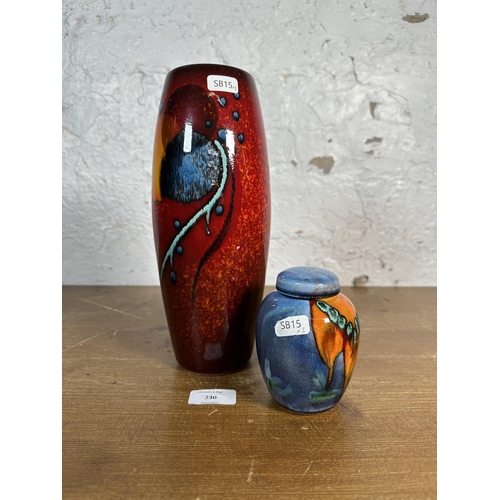 230 - Two pieces of studio pottery, one Alan Clarke vase - approx. 27cm high and one Poole Pottery jar and... 