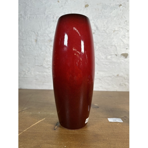 230 - Two pieces of studio pottery, one Alan Clarke vase - approx. 27cm high and one Poole Pottery jar and... 