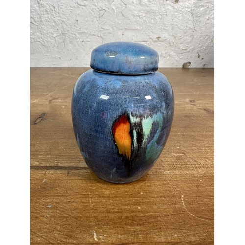 230 - Two pieces of studio pottery, one Alan Clarke vase - approx. 27cm high and one Poole Pottery jar and... 