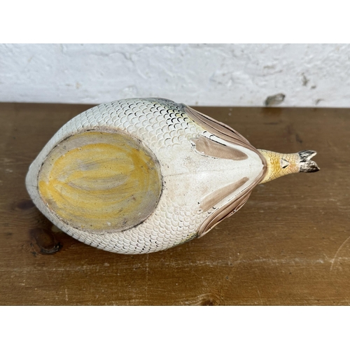 232 - A 19th century Majolica swallowing fish teapot - approx. 19cm high x 26cm long