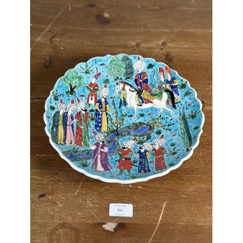 251 - A vintage Turkish Kutahya hand painted ceramic charger - approx. 28.5cm in diameter