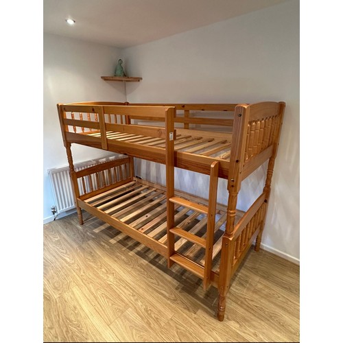 2 - A pine bunk bed