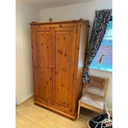 3 - A pine double wardrobe - approx. 174cm high x 106cm wide x 60cm deep