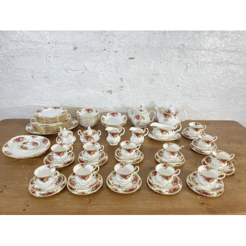 291 - A large collection of Royal Albert Old Country Roses fine bone china to include tea and coffee pots,... 