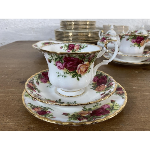 291 - A large collection of Royal Albert Old Country Roses fine bone china to include tea and coffee pots,... 