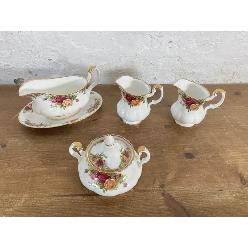 291 - A large collection of Royal Albert Old Country Roses fine bone china to include tea and coffee pots,... 