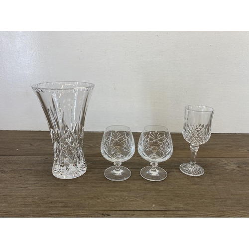 298 - A collection of glassware to include Edinburgh Crystal cut glass decanter, clear and blue cut glass ... 