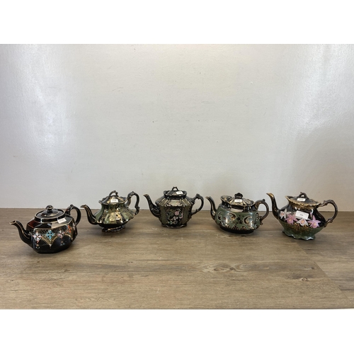 306 - Five Victorian jetware teapots