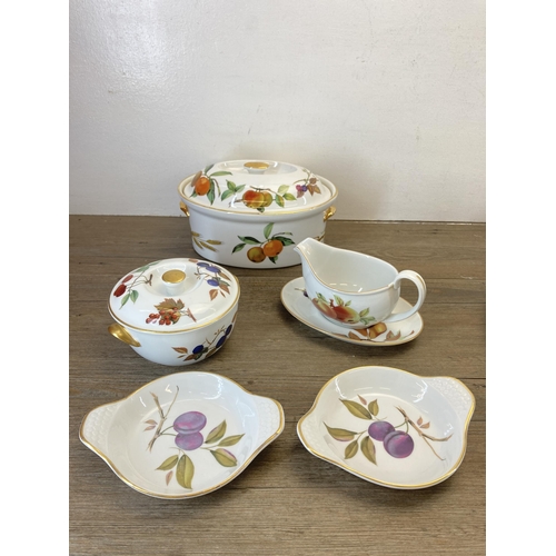 317 - A collection of Royal Worcester Evesham china to include four lidded tureens, ramekins etc.