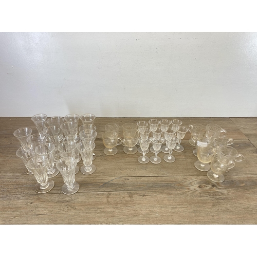 319 - A collection of Victorian and later glassware to include jelly glasses, jelly cups with etched flora... 