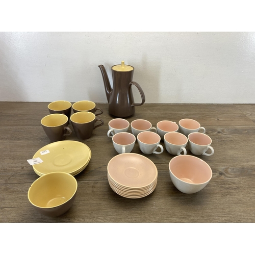 321 - Two Poole Pottery part tea sets, one C97 pattern seventeen piece and one C107 ten piece