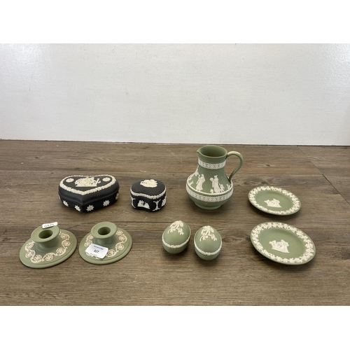 327 - Nine pieces of Wedgwood sage green and black Jasperware