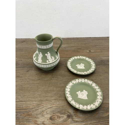 327 - Nine pieces of Wedgwood sage green and black Jasperware