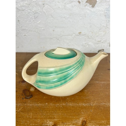 277 - An Art Deco T-Flo green and cream ceramic teapot - approx. 12cm high x 25cm long