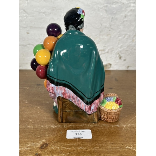 256 - A Royal Doulton The Old Balloon Seller figurine - HN1315