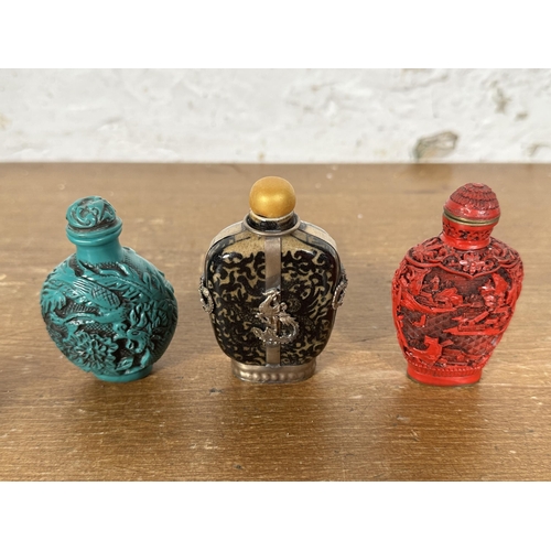 272 - Ten Oriental scent bottles to include carved red cinnabar, reverse glass painted, erotic etc.