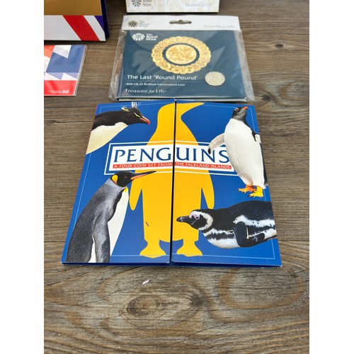 2378 - A collection of British Coins to include Penguins The Falkland Islands four coin set, 1901-2001 £5, ... 