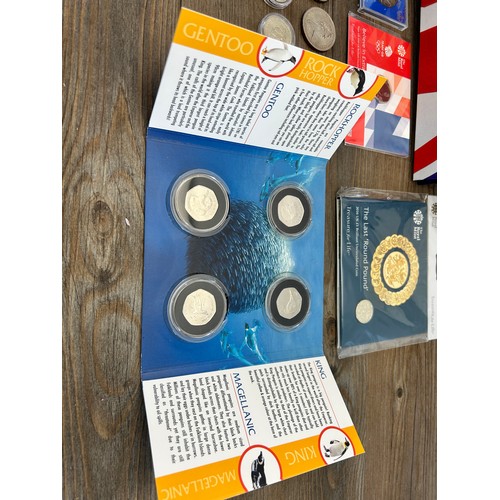 2378 - A collection of British Coins to include Penguins The Falkland Islands four coin set, 1901-2001 £5, ... 