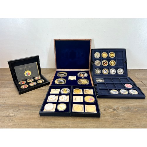 2381 - Six cased collections of gold plated and silver plated collectable coins with two 92.5% silver proof... 