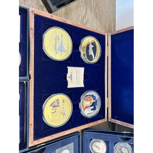 2381 - Six cased collections of gold plated and silver plated collectable coins with two 92.5% silver proof... 