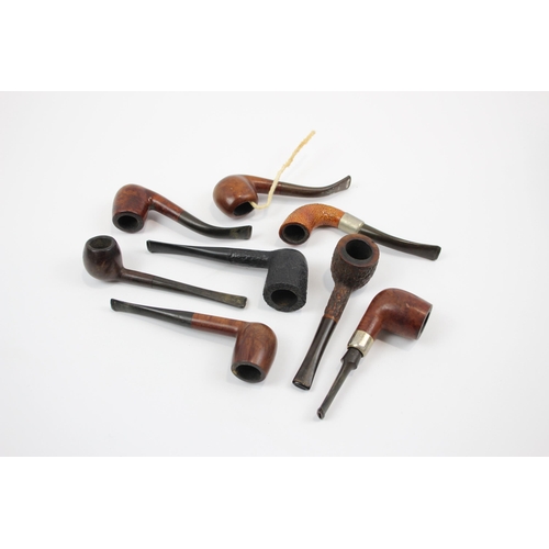 2341 - A collection of smoking pipes to include Tom Cobley, Duncan Briar Straight Billiard etc.