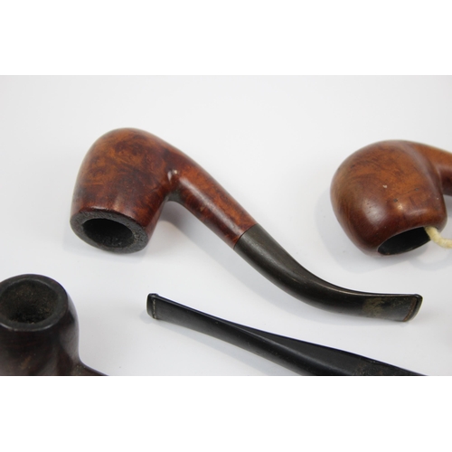 2341 - A collection of smoking pipes to include Tom Cobley, Duncan Briar Straight Billiard etc.