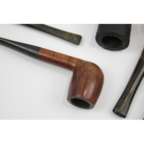 2341 - A collection of smoking pipes to include Tom Cobley, Duncan Briar Straight Billiard etc.