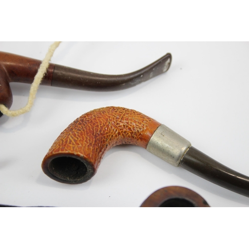 2341 - A collection of smoking pipes to include Tom Cobley, Duncan Briar Straight Billiard etc.