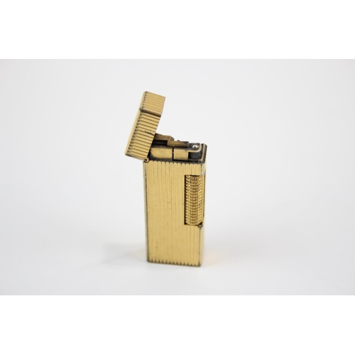 2342 - A Dunhill Rollagas gold plated cigarette lighter