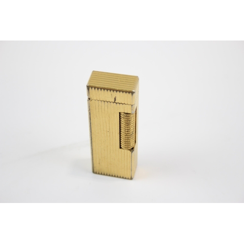 2342 - A Dunhill Rollagas gold plated cigarette lighter