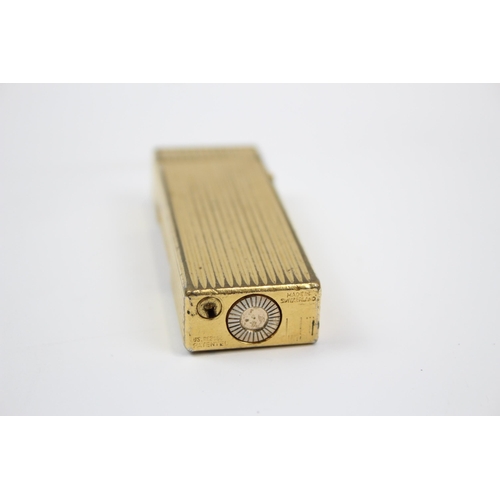 2342 - A Dunhill Rollagas gold plated cigarette lighter