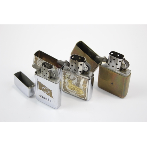 2343 - Three Zippo cigarette lighters