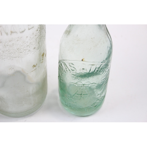 285 - Six vintage glass bottles to include lemonade, Urmston Bros Tonge etc.