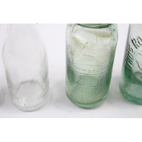 285 - Six vintage glass bottles to include lemonade, Urmston Bros Tonge etc.