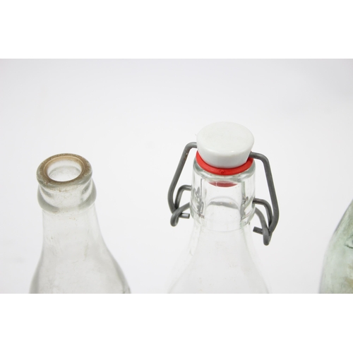 285 - Six vintage glass bottles to include lemonade, Urmston Bros Tonge etc.