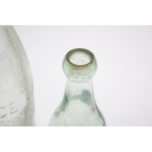 285 - Six vintage glass bottles to include lemonade, Urmston Bros Tonge etc.