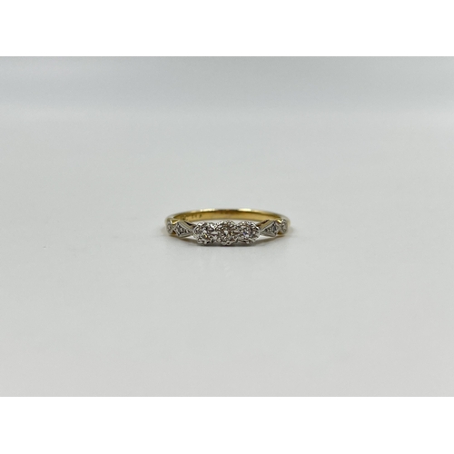 2151 - An 18ct gold and platinum diamond trilogy ring with diamond shoulders - approx. gross weight 3g