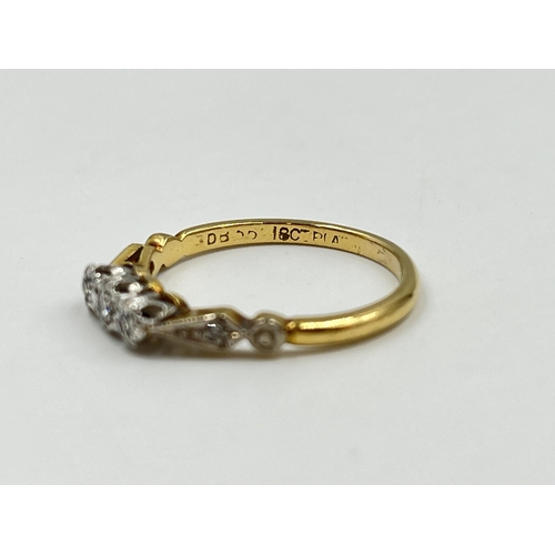 2151 - An 18ct gold and platinum diamond trilogy ring with diamond shoulders - approx. gross weight 3g