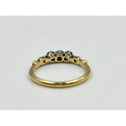 2151 - An 18ct gold and platinum diamond trilogy ring with diamond shoulders - approx. gross weight 3g