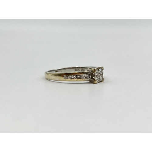 2152 - A hallmarked 18ct white gold and .050ct diamond ring - approx. gross weight 3.61g