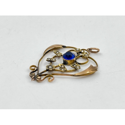 2156 - An Art Nouveau 9ct gold blue paste and seed pearl lavalier pendant - approx. gross weight 2.5g