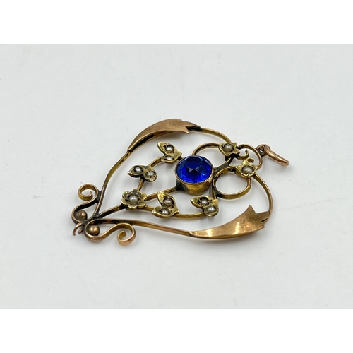 2156 - An Art Nouveau 9ct gold blue paste and seed pearl lavalier pendant - approx. gross weight 2.5g