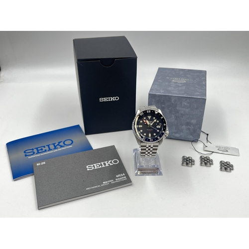 2272A - A boxed Seiko 5 GMT SSK003K1 automatic 42mm men's wristwatch with exhibition case back, spare links,... 