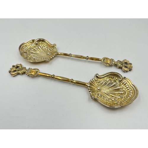 2273 - A cased pair of Victorian Jackson & Deere hallmarked London silver serving spoons, dated 1887 - appr... 