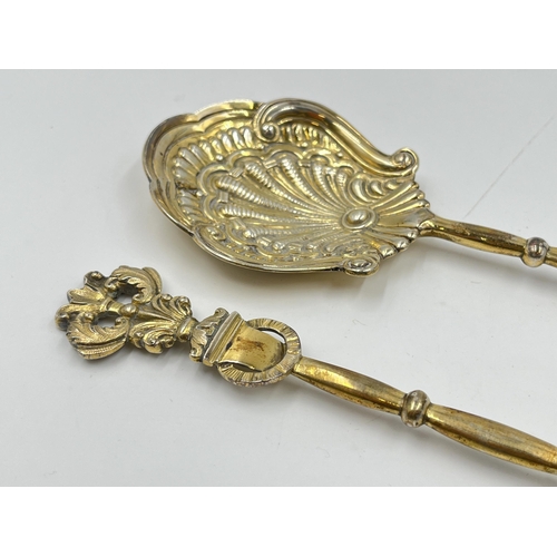 2273 - A cased pair of Victorian Jackson & Deere hallmarked London silver serving spoons, dated 1887 - appr... 