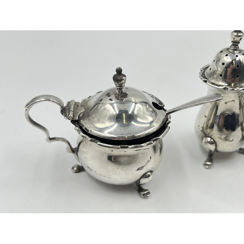 2277 - An Adie Brothers Ltd hallmarked Birmingham silver three piece cruet set, dated 1922 and two .925 sil... 