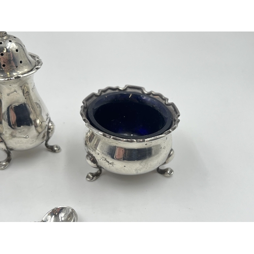 2277 - An Adie Brothers Ltd hallmarked Birmingham silver three piece cruet set, dated 1922 and two .925 sil... 