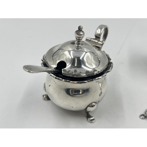 2277 - An Adie Brothers Ltd hallmarked Birmingham silver three piece cruet set, dated 1922 and two .925 sil... 